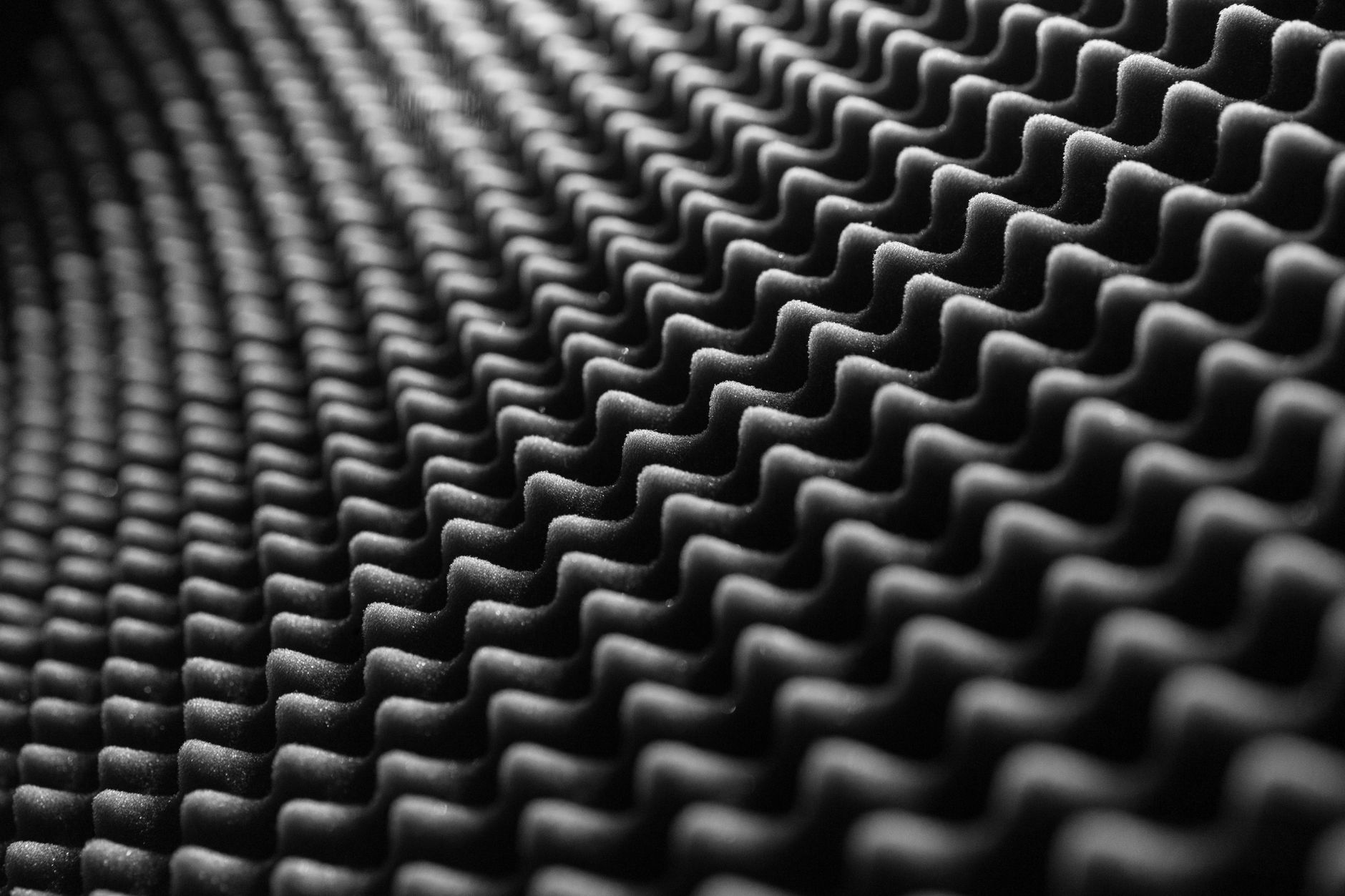 Close up of photo editing software showing sharpening and noise reduction sliders for drone photo.